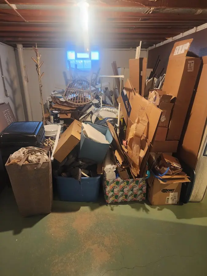 Roll-off dumpster container at job site for Construction Dumpster Rental in Pinson